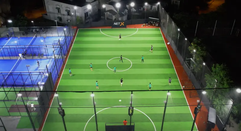 Aerial view of a futsal match at NETX